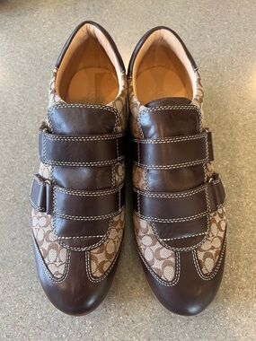 Coach Susanna fashion sneakers signature logo adjustable. Size 10. Never worn.